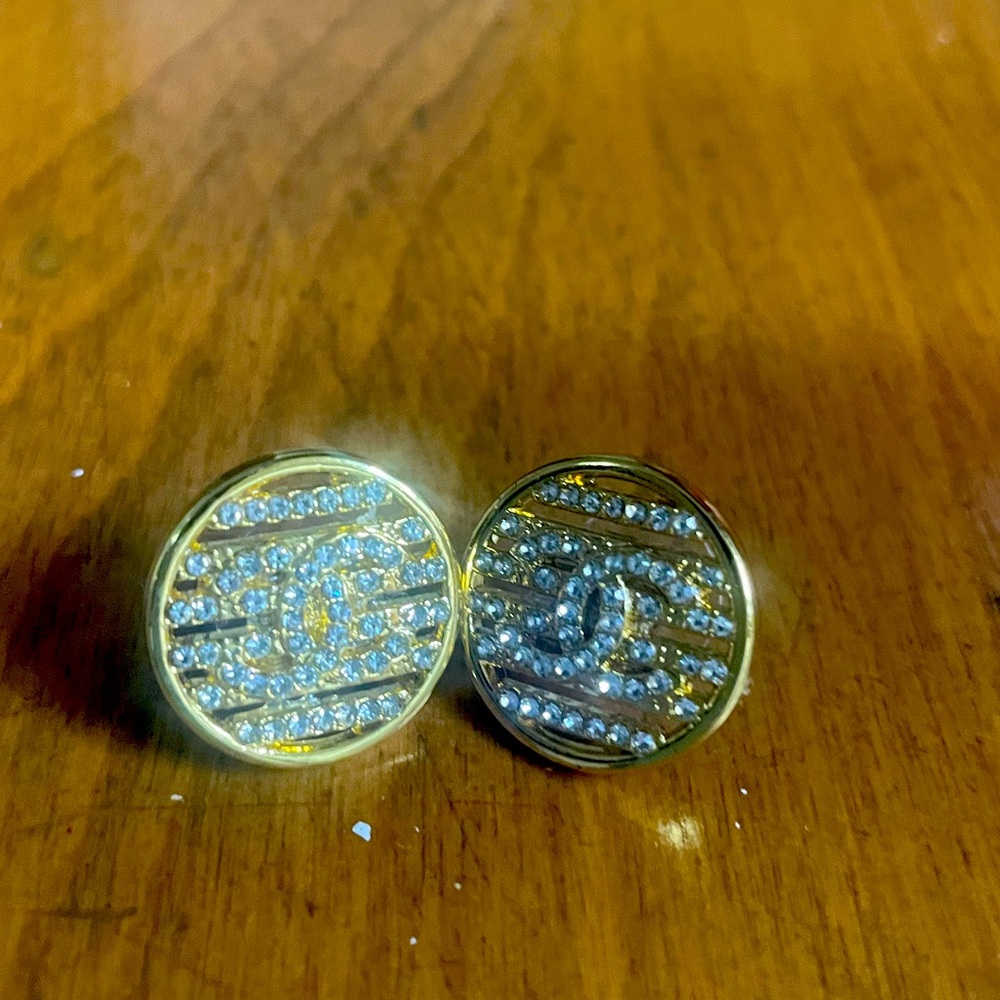 Upcycled Chanel buttons into pierced earrings.